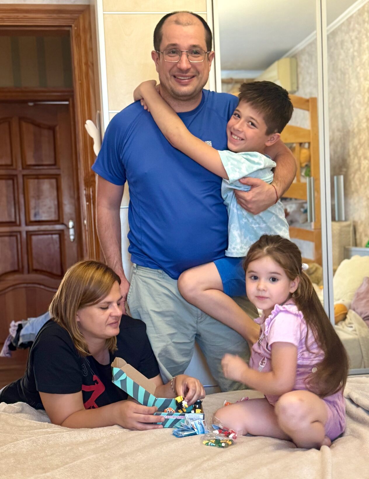 Serhii Tatiana and 2 kids.jpg
